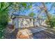 Backyard view of the house with patio at 3147 Canary Ct, Decatur, GA 30032