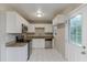 Updated kitchen with white cabinets and granite countertops at 3147 Canary Ct, Decatur, GA 30032