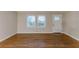 Bright living room featuring hardwood floors and neutral walls at 3147 Canary Ct, Decatur, GA 30032