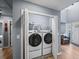 Convenient laundry room with washer and dryer at 3030 Sawtooth Cir, Johns Creek, GA 30022