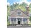 Illustration of a charming home with a gray facade, white trim, and a classic chimney at 11792 Serenbe Ln, Chattahoochee Hills, GA 30268