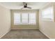 Bedroom with three windows and ceiling fan at 1360 Lockhaven Sw Cir, Atlanta, GA 30311