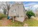 Beige house exterior with wooden steps and backyard at 1360 Lockhaven Sw Cir, Atlanta, GA 30311