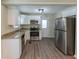 Modern kitchen with granite countertops and stainless steel appliances at 1360 Lockhaven Sw Cir, Atlanta, GA 30311