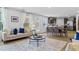 Spacious living room with eat-in kitchen features modern decor and lots of natural light at 819 Major Oak Ct, Villa Rica, GA 30180