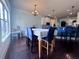 Bright dining room with table and chairs, adjacent to kitchen at 2239 Noelle Pl, Powder Springs, GA 30127