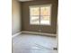 Bedroom with neutral walls and carpet with a large window at 3345 Hillshire Dr, Cumming, GA 30028