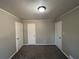 Simple bedroom with neutral walls and carpet flooring at 721 Yale Sw Pl, Atlanta, GA 30315