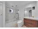 Bathroom with a tub, shower, and modern vanity at 1136 Goodwin Ne Rd, Atlanta, GA 30324