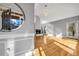 Sunlit living room with hardwood floors and fireplace at 1136 Goodwin Ne Rd, Atlanta, GA 30324