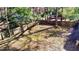 Large backyard surrounded by trees and a wooden fence at 627 Huntington Nw Way, Lilburn, GA 30047