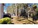 Spacious backyard with wooden fence and deck at 627 Huntington Nw Way, Lilburn, GA 30047
