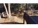 View from deck of fenced backyard and trees at 627 Huntington Nw Way, Lilburn, GA 30047