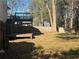 Private backyard with a deck and a storage shed at 627 Huntington Nw Way, Lilburn, GA 30047