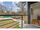 View from private balcony overlooking the fenced in backyard at 2208 Baker Nw Rd, Atlanta, GA 30318