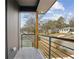 Balcony featuring black iron railings with neighborhood views at 2208 Baker Nw Rd, Atlanta, GA 30318