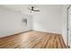 A spacious bedroom is showcasing hardwood floors and a ceiling fan for added comfort at 2208 Baker Nw Rd, Atlanta, GA 30318