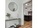 Entryway with console table, mirror, and a view of the kitchen at 2208 Baker Nw Rd, Atlanta, GA 30318