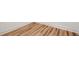 Close up on the home's beautiful light hardwood flooring and white baseboards at 2208 Baker Nw Rd, Atlanta, GA 30318