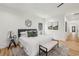 Bright bedroom suite with modern flooring, ceiling fan, and large windows at 2208 Baker Nw Rd, Atlanta, GA 30318