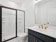 Modern bathroom with a glass-enclosed shower, a stylish vanity, and sleek fixtures for a luxurious feel at 688 Calvet Way, Cumming, GA 30041