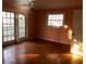 This bedroom features natural light and private outdoor access via the french doors at 138 Le Brun Ne Rd, Atlanta, GA 30342