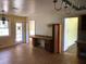 Open dining area with desk, exterior door, and views to other rooms, bathed in natural light at 138 Le Brun Ne Rd, Atlanta, GA 30342