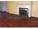 Living room with hardwood floors and fireplace, offering a cozy and inviting space at 138 Le Brun Ne Rd, Atlanta, GA 30342