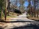 Quiet tree-lined street with residential traffic at 138 Le Brun Ne Rd, Atlanta, GA 30342