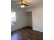 Bedroom with wood-look floors and closet at 2254 Wellington Cir, Lithonia, GA 30058