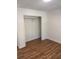 Bedroom with a spacious closet, offering ample storage at 2254 Wellington Cir, Lithonia, GA 30058