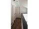 Clean hallway with dark trim and hardwood flooring at 2254 Wellington Cir, Lithonia, GA 30058