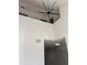 Two-story entryway with modern light fixture and open railing at 2254 Wellington Cir, Lithonia, GA 30058