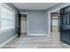 Cozy bedroom with wood-look flooring at 4598 Flint Hill Rd, Austell, GA 30106