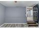 Simple bedroom with gray walls and wood-look flooring at 4598 Flint Hill Rd, Austell, GA 30106