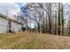 Grey siding house exterior with steps and a large backyard at 4598 Flint Hill Rd, Austell, GA 30106