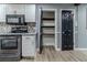 Modern kitchen with stainless steel appliances and pantry at 4598 Flint Hill Rd, Austell, GA 30106