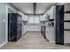 Renovated kitchen featuring white cabinets and granite countertops at 4598 Flint Hill Rd, Austell, GA 30106