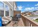 Back deck area with furniture overlooking a residential neighborhood at 100 Marietta Walk Trce, Marietta, GA 30064