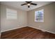 Empty bedroom with hardwood floors and plenty of natural light at 516 Richards Rd, White, GA 30184