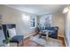 Cozy sitting room area with hardwood floors and natural light at 516 Richards Rd, White, GA 30184