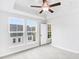 Spacious bedroom with two windows and carpet flooring at 1923 Rogers Ct, Atlanta, GA 30318