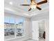 Bright bedroom with two large windows and ceiling fan at 1923 Rogers Ct, Atlanta, GA 30318