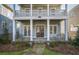 Back porch with stone pathway and landscaping at 241 Thompson St, Alpharetta, GA 30009