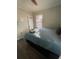 Bright bedroom with a queen-size bed and wood-look floors at 534 Hamilton E Holmes Dr, Atlanta, GA 30318