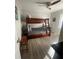 Bedroom with a full-size bunk bed and wood-look floors at 534 Hamilton E Holmes Dr, Atlanta, GA 30318