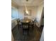 Small dining area with round table and four chairs at 534 Hamilton E Holmes Dr, Atlanta, GA 30318