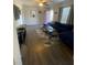 Living room with sectional sofa and wood-look floors at 534 Hamilton E Holmes Dr, Atlanta, GA 30318