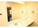 Bathroom vanity with sink and mirror at 7940 White Oak Loop, Lithonia, GA 30038