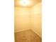 Empty walk-in closet with neutral carpet flooring and wall-mounted wire shelving at 7940 White Oak Loop, Lithonia, GA 30038